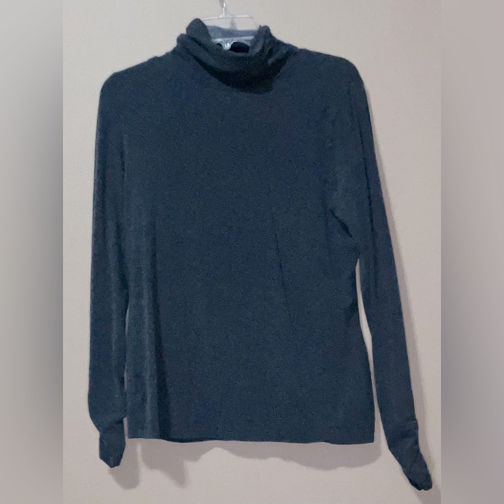 Turtleneck knit top with rouched sleeves